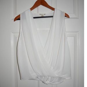 White sheer blouse with tie back. Small.